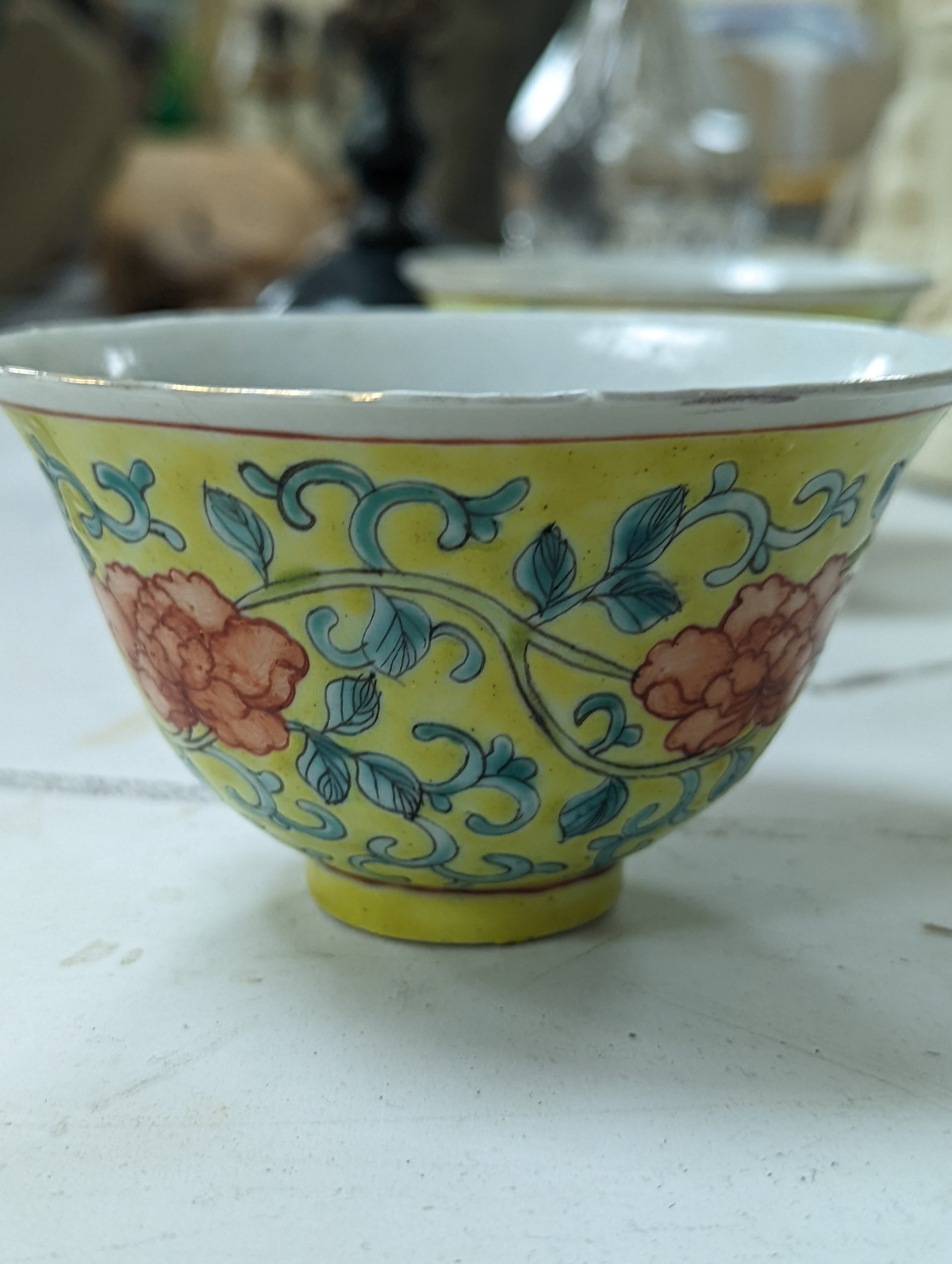 A group of Chinese porcelain, 19th /20th century, to include a pair of yellow ground bowls, 10.8 cm diameter, a blue and white vase, Xuande mark, a similar bowl and vase, and a champleve enamel bronze koro and cover